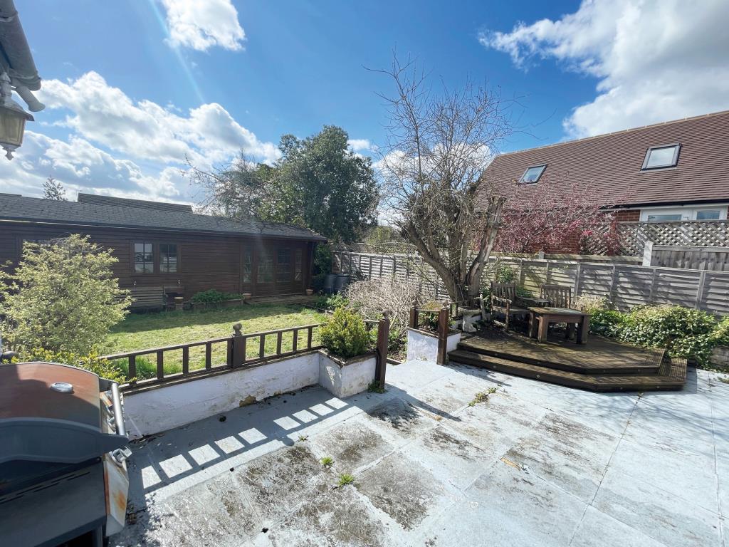 Lot: 93 - DETACHED BUNGALOW FOR IMPROVEMENT - rear garden pation and log cabin